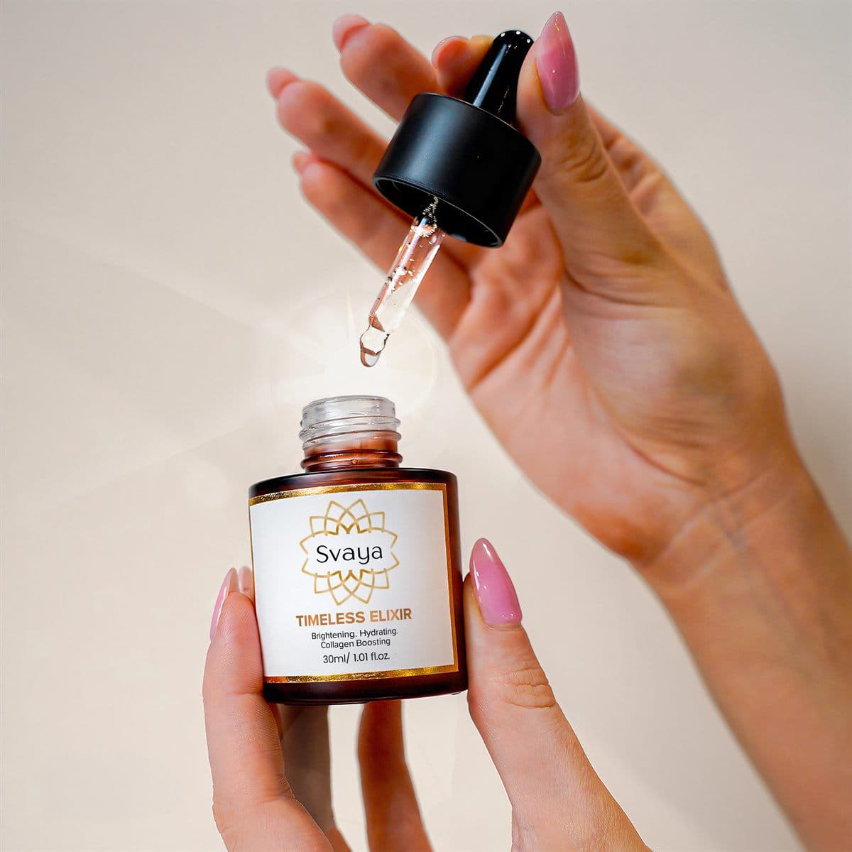 Hands holding the Timeless Elixir bottle